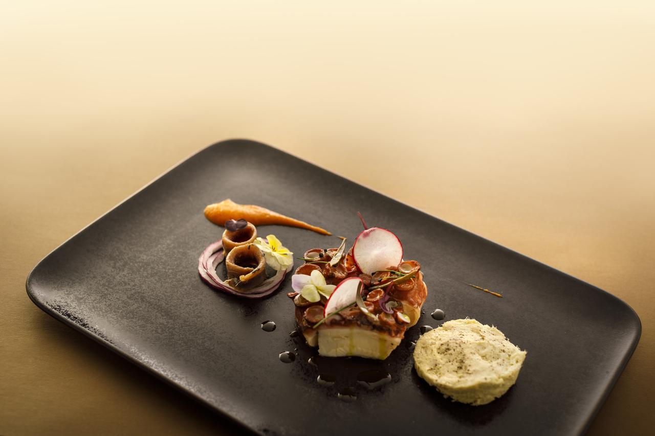Boutique & Design Hotel Navis - Small Luxury Hotels Of The World Opatija Exterior foto A dish by the restaurant